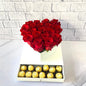 Arreglo 18 rosas rojas con corazon blanco con gaveta y 12 chocolates Ferrero Rocher