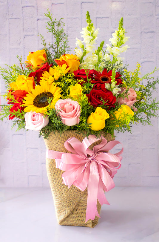 Arreglos de flores con lazo